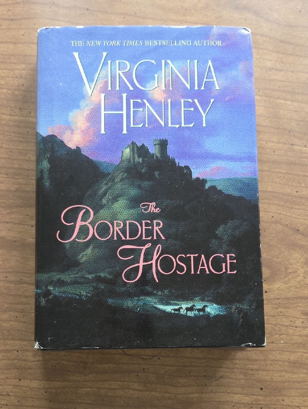 Virginia Henley "The Border Hostage" Hard Book , Used Condition.